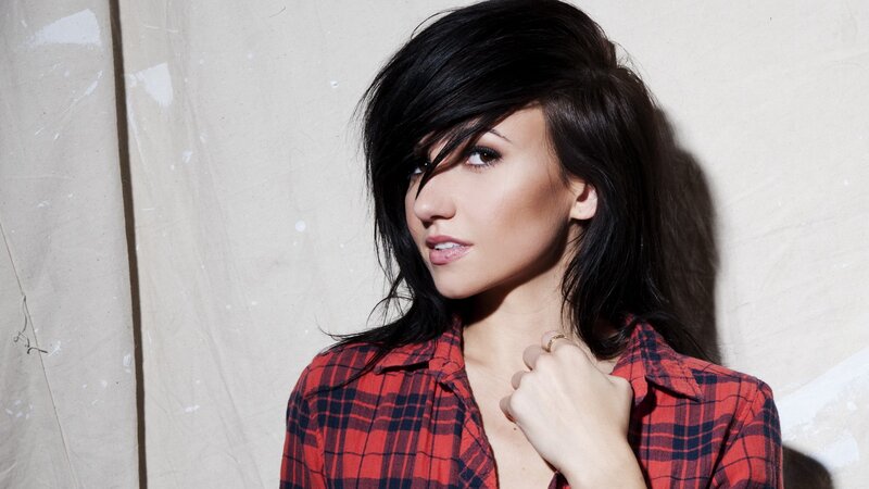 woman in red plaid shirt