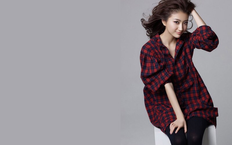 woman in red plaid shirt