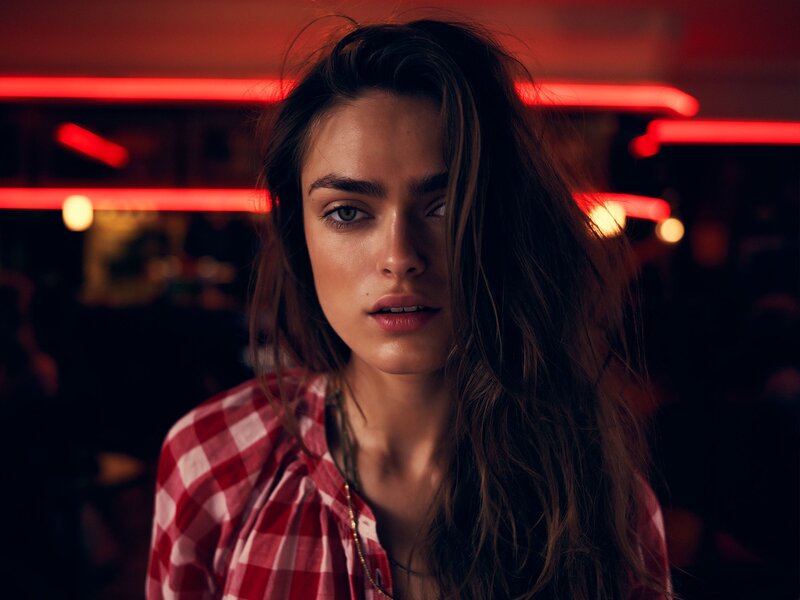 woman in red plaid shirt