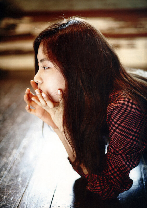 woman in red plaid shirt
