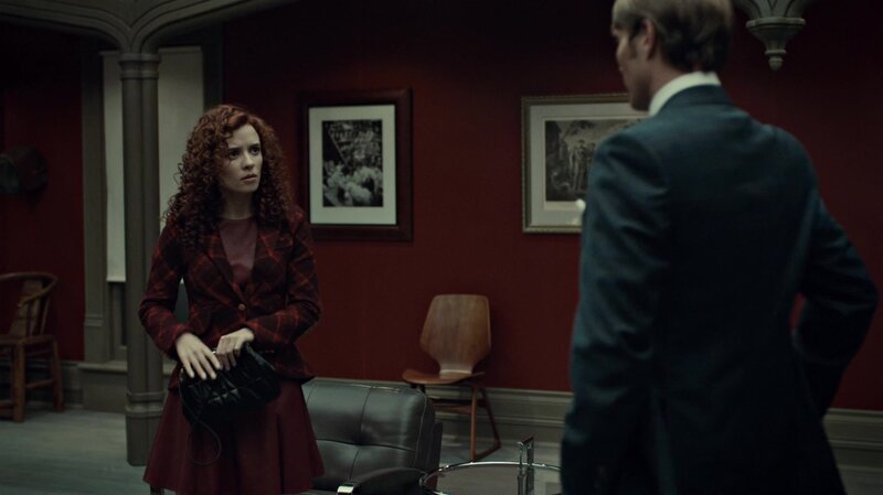 woman in red plaid suit