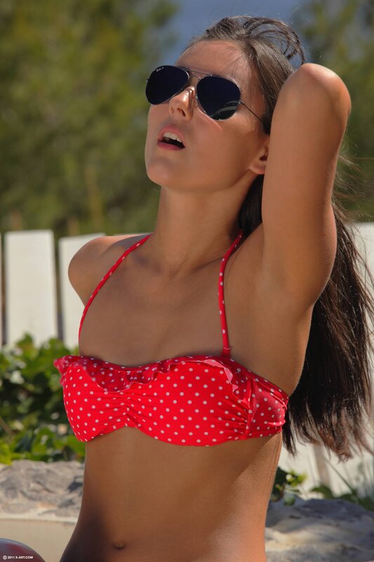 woman in red polka dot bikini