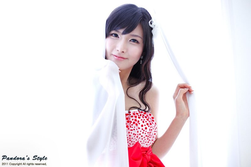 woman in red polka-dot dress