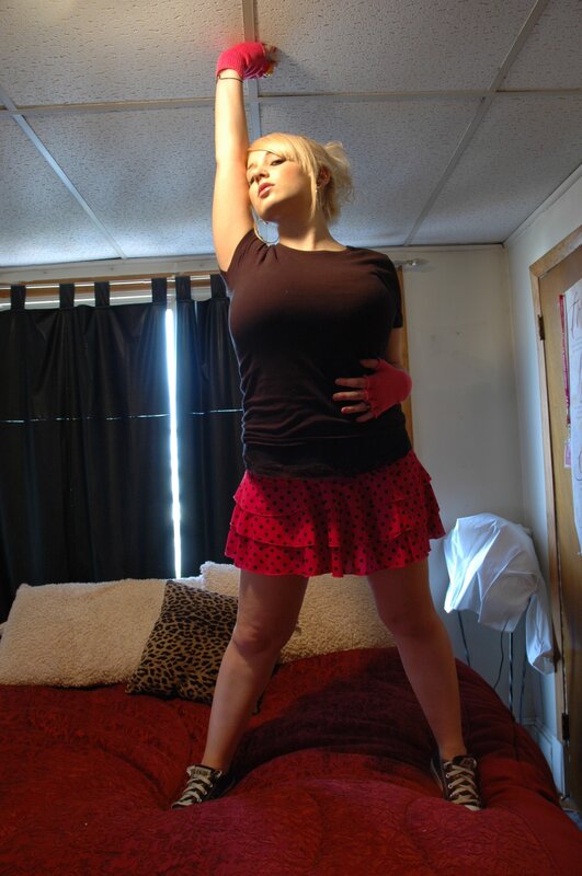 woman in red polka-dot skirt