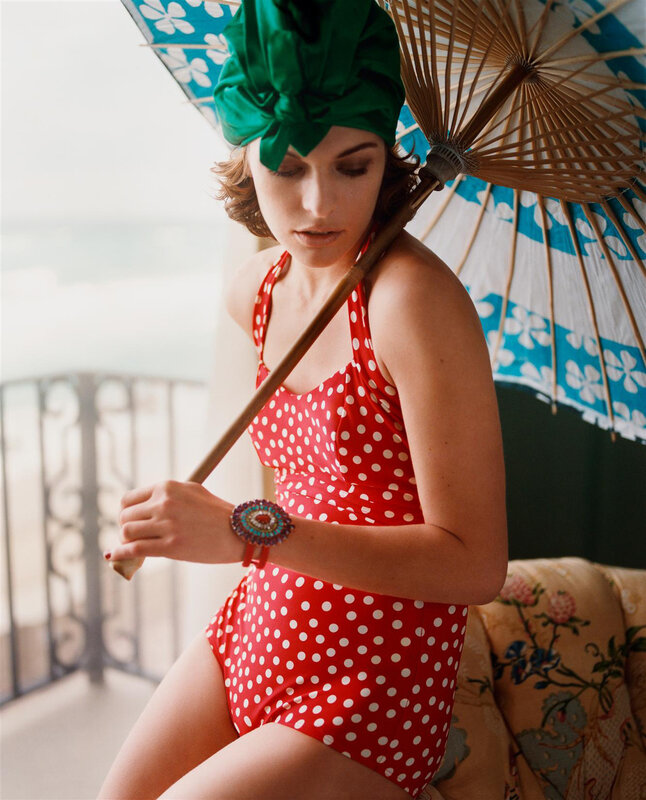 woman in red polka dot swimsuit