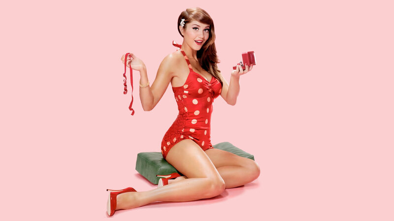 woman in red polka dot swimsuit