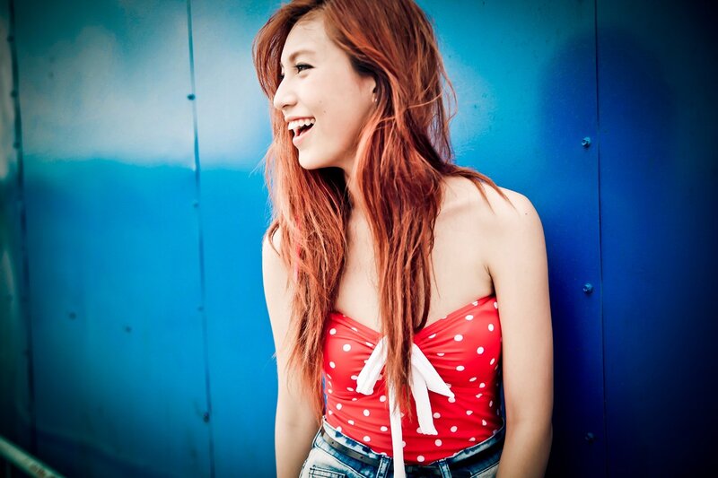 woman in red polka-dot top