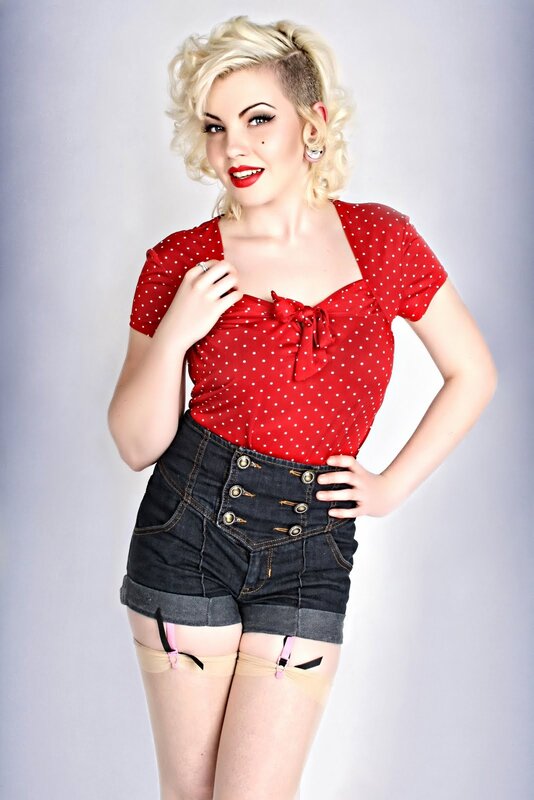 woman in red polka-dot top