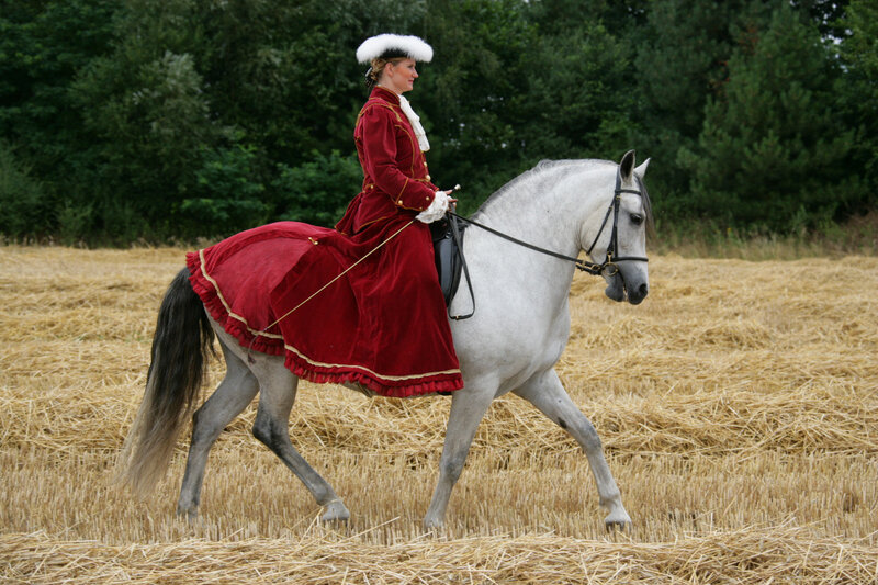 Woman in Red Riding a Horse