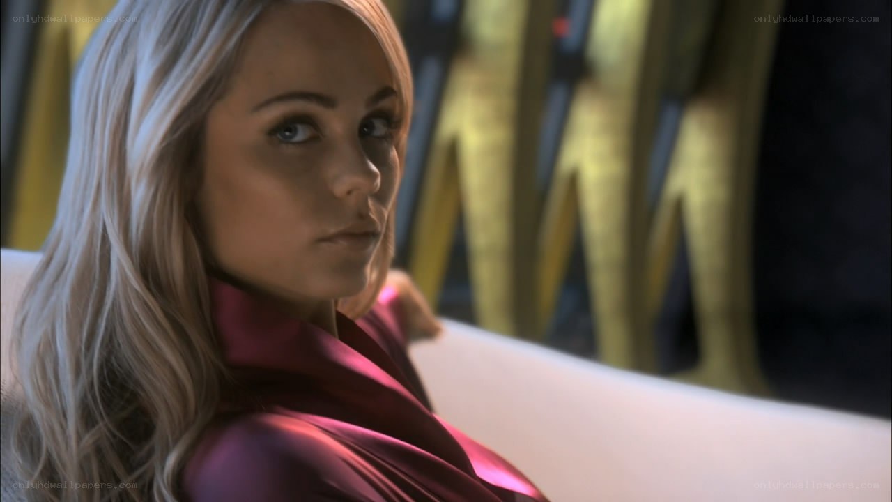 woman in red robe looking back