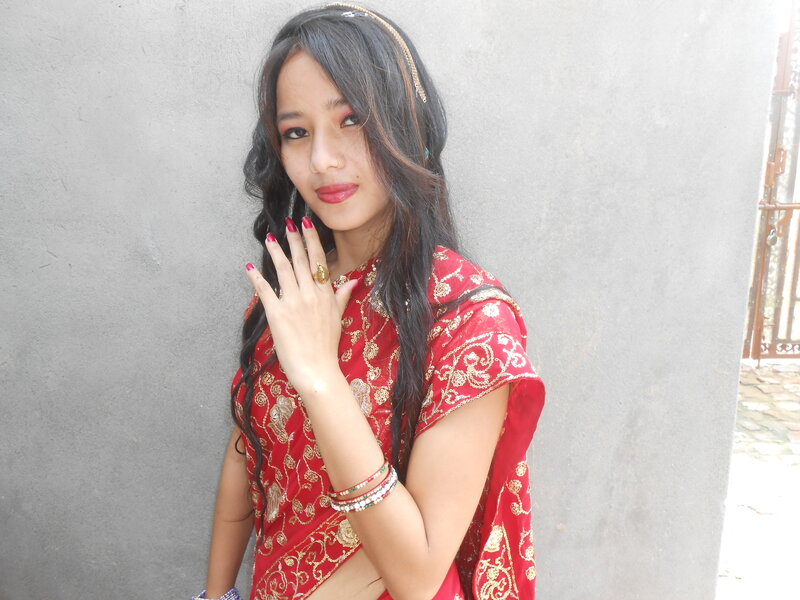 Woman in Red Sari — Calm, Afternoon