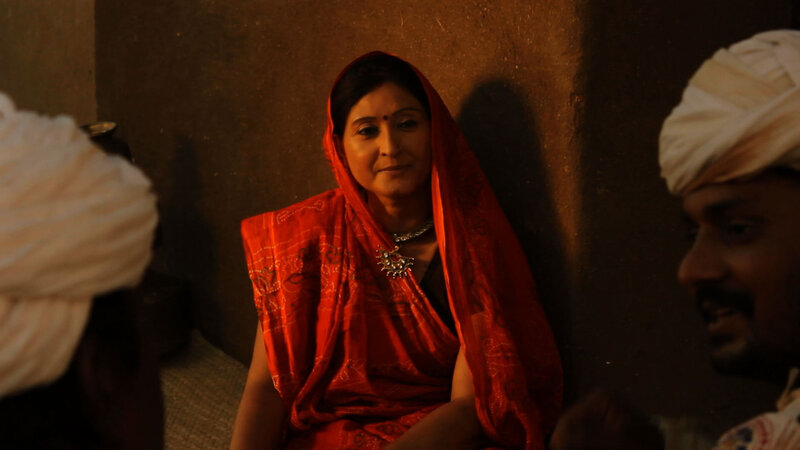 Woman in Red Sari — Dramatic, Night, Photograph