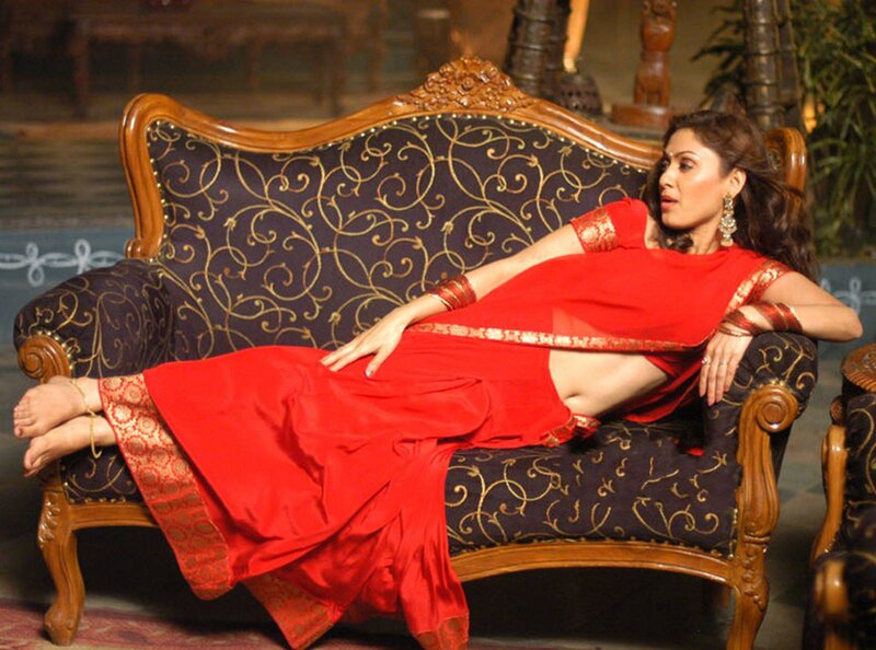 Woman in Red Sari — Dramatic, Photograph, Ornate Sofa