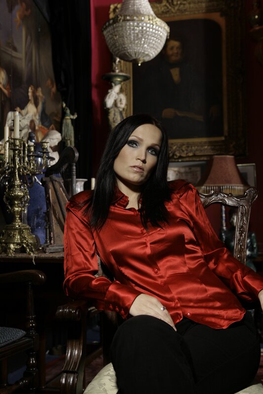 woman in red satin shirt