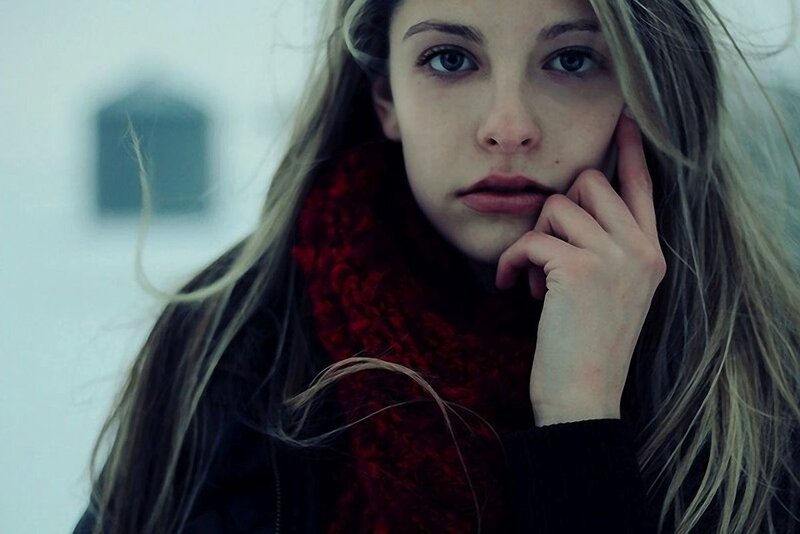 woman in red scarf outdoors