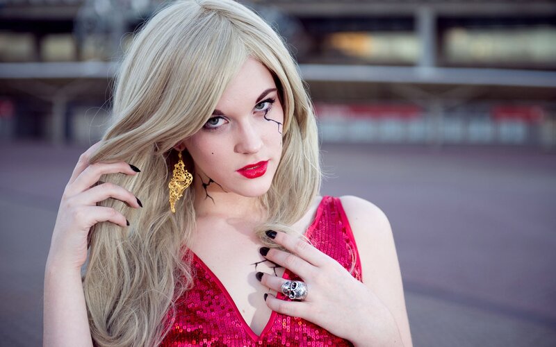 woman in red sequin dress