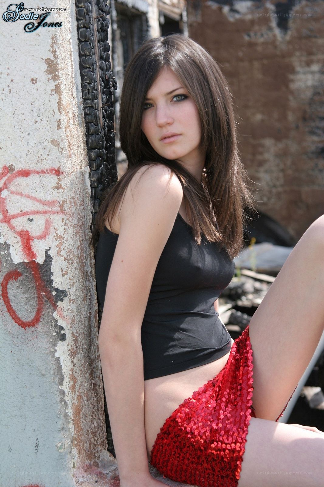 woman in red sequins posing