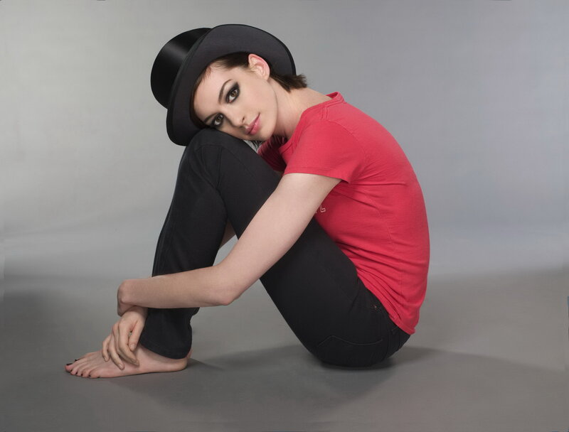 woman in red shirt and hat