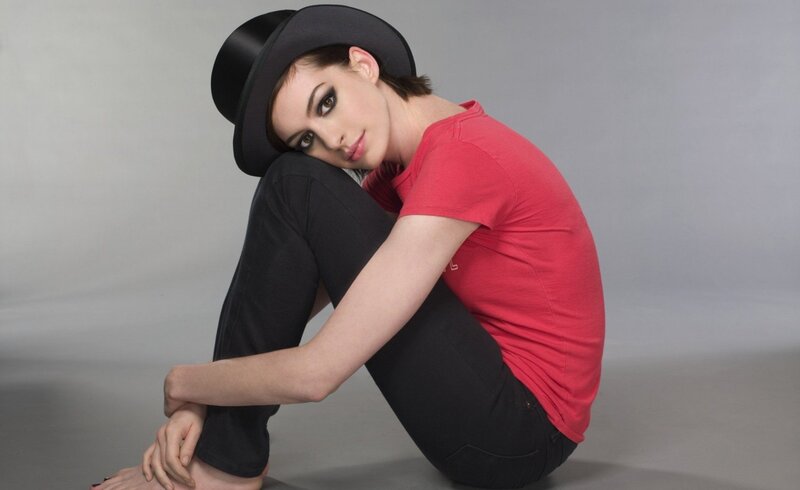 woman in red shirt and hat