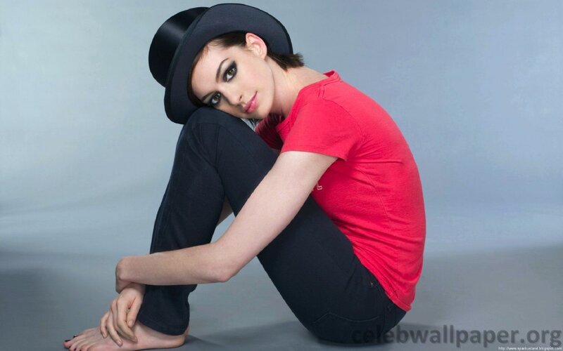 woman in red shirt and hat