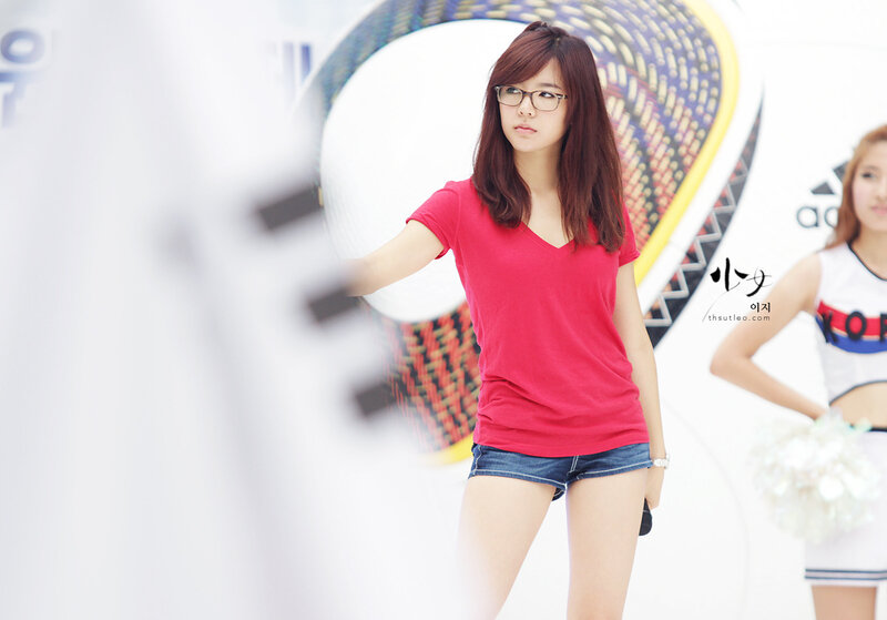 woman in red shirt at event