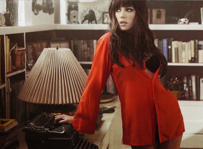 Woman in red shirt at typewriter