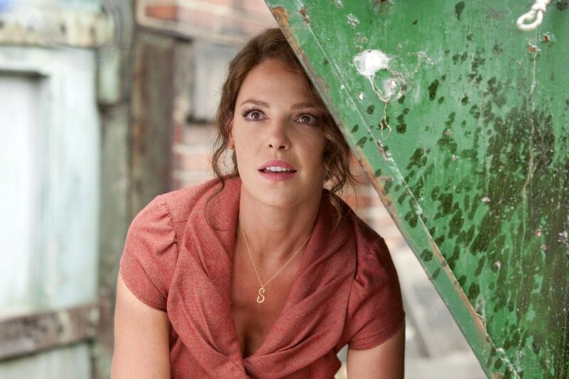 Woman in Red Shirt — Dramatic, Photograph, Green Metal Object