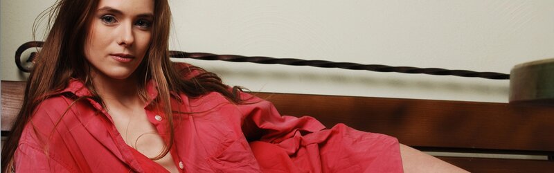 woman in red shirt on bench