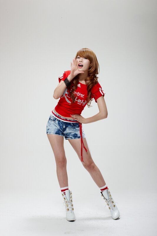 woman in red shirt posing