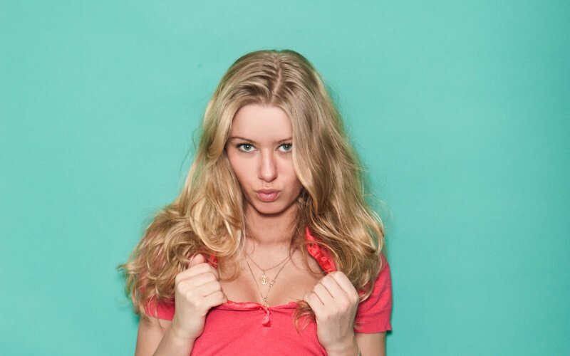 woman in red shirt posing