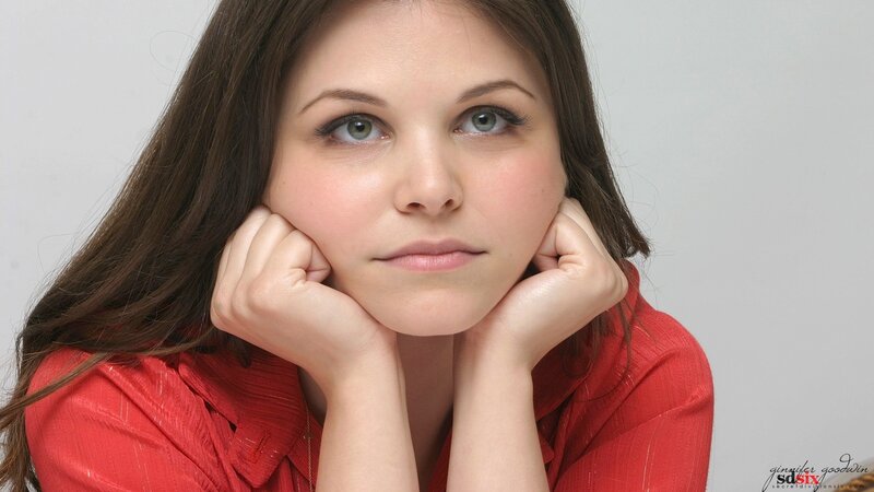 woman in red shirt posing