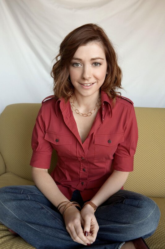 woman in red shirt sitting