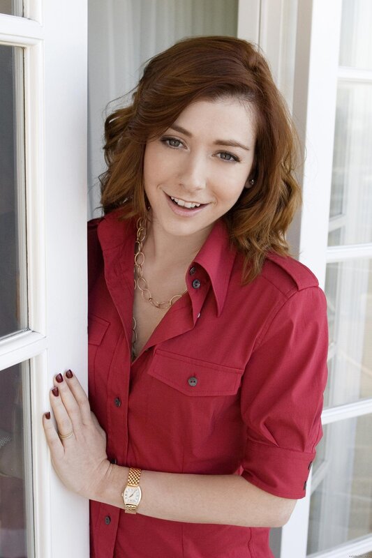 woman in red shirt smiling