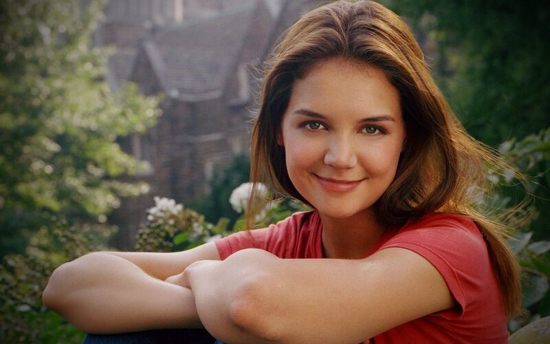 woman in red shirt smiling