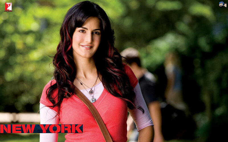 woman in red shirt smiling