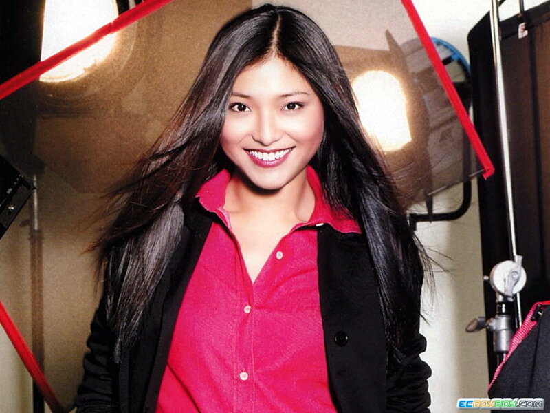woman in red shirt smiling