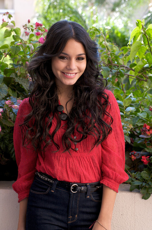 woman in red shirt smiling