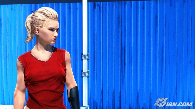 woman in red shirt standing
