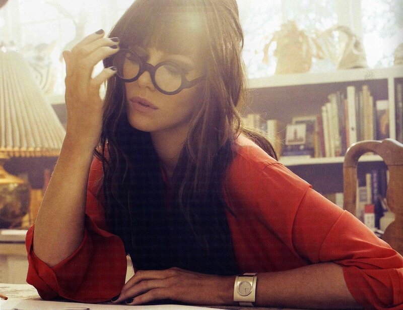 woman in red shirt with glasses