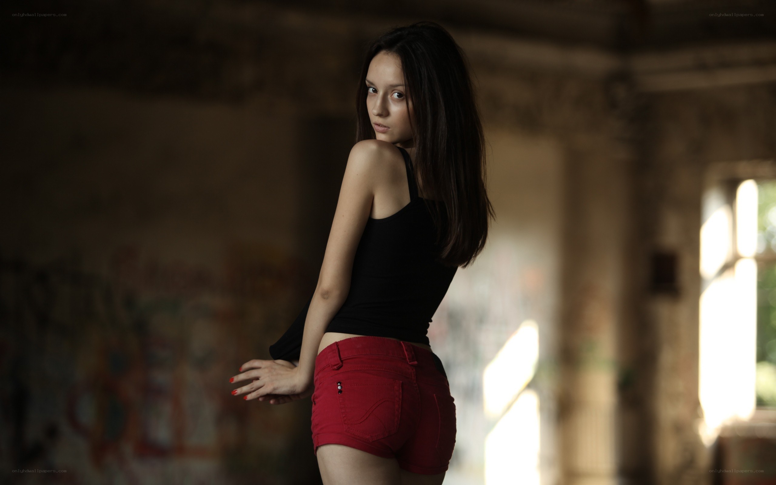 woman in red shorts