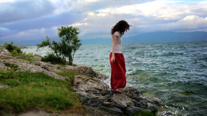 Woman in Red Skirt — Dramatic, Afternoon