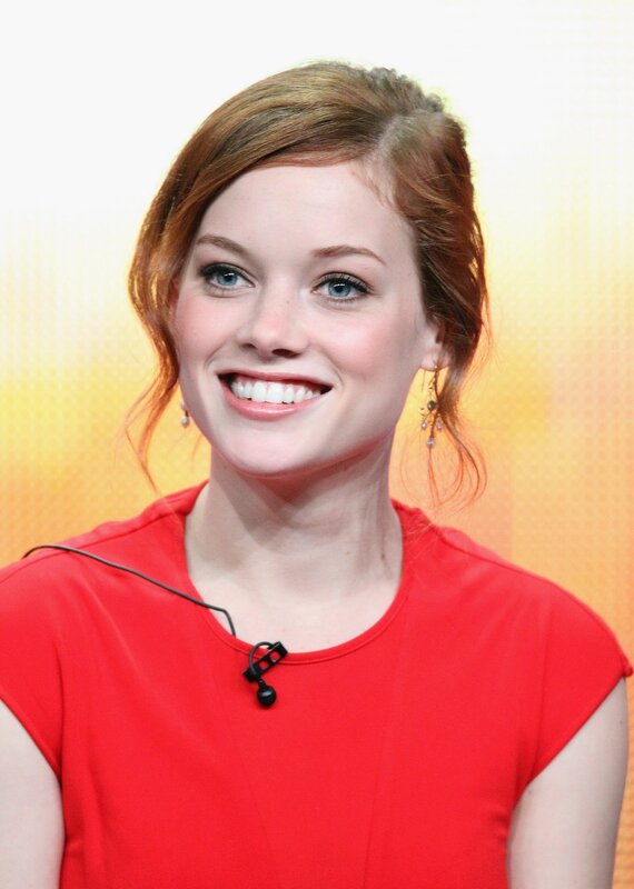 woman in red smiling