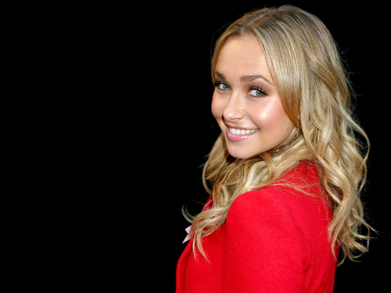woman in red smiling