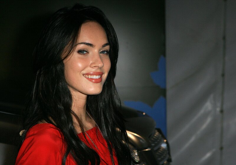 woman in red smiling