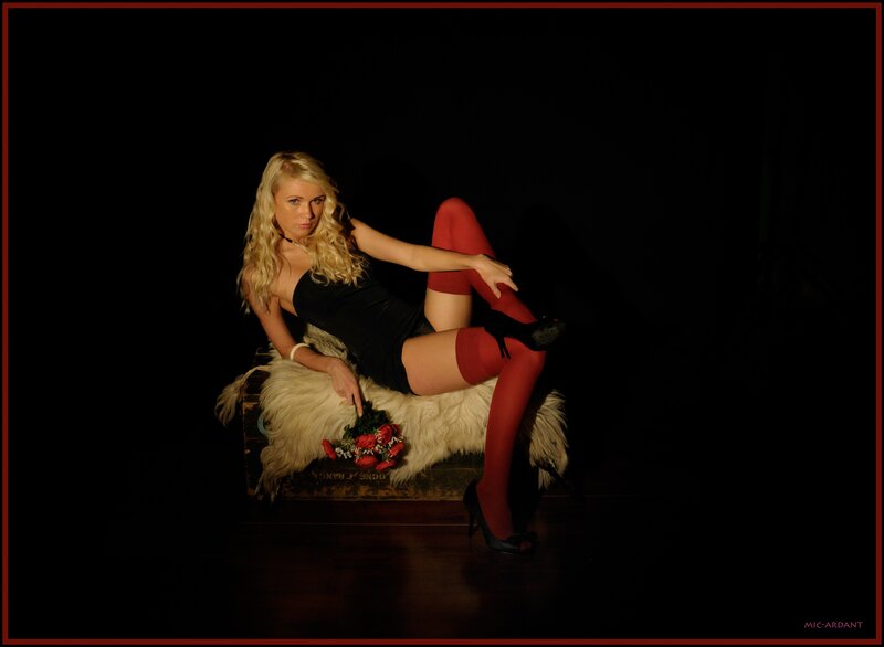 woman in red stockings posing