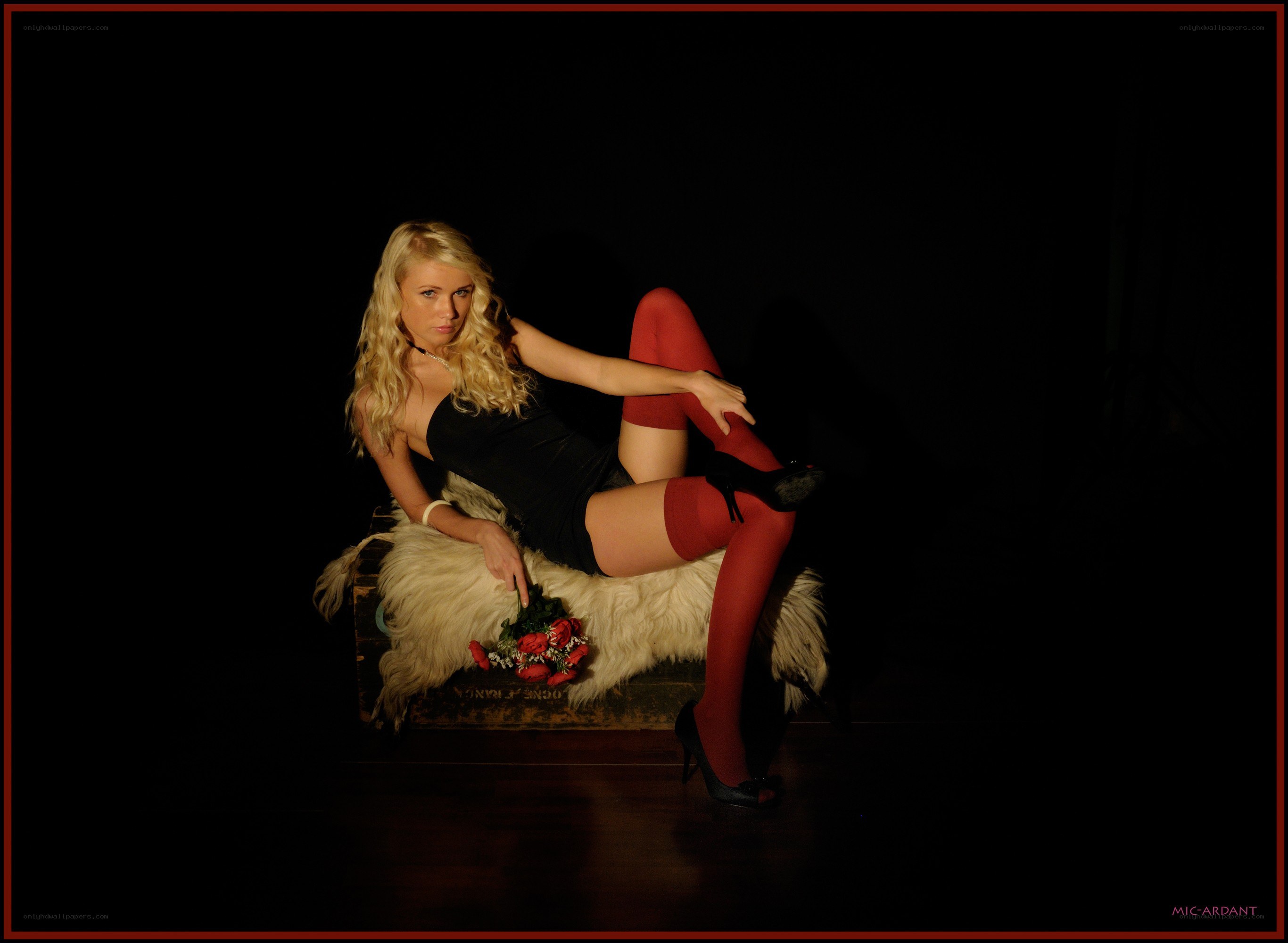 woman in red stockings posing