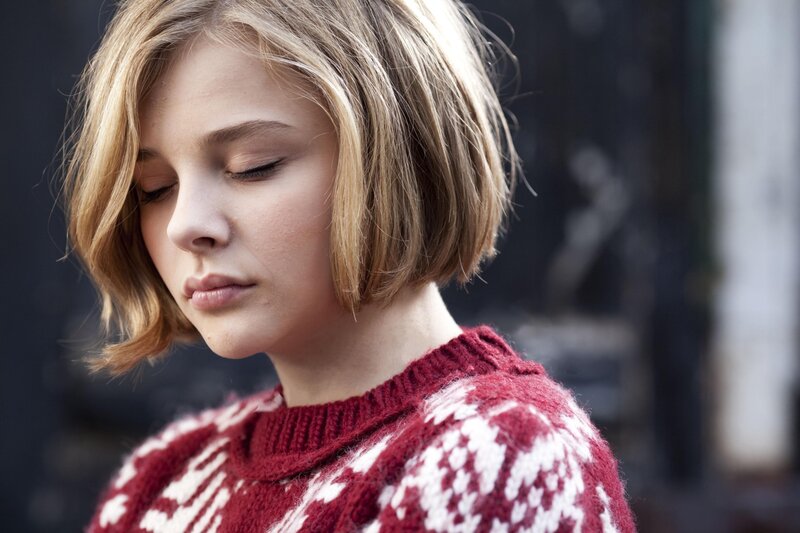 woman in red sweater