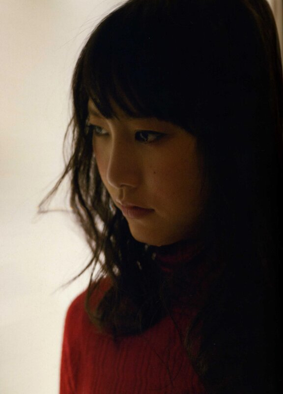 woman in red sweater
