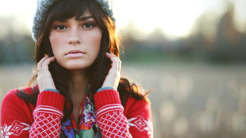 woman in red sweater