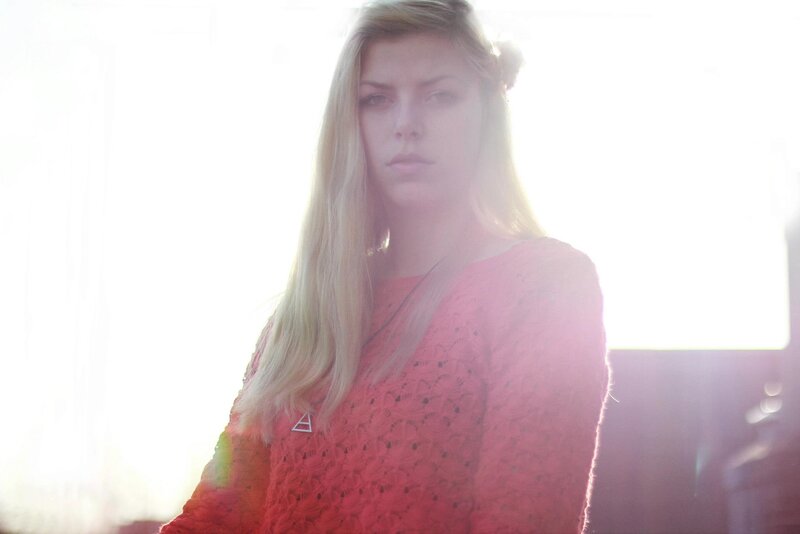 woman in red sweater